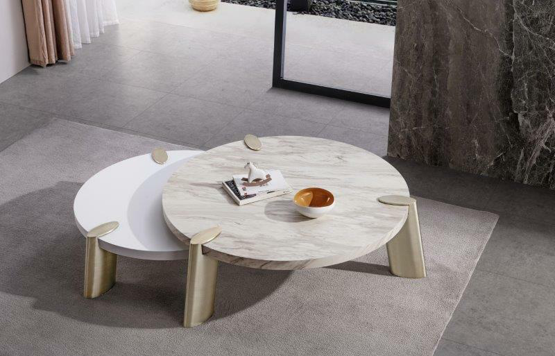 round white coffee table with smaller matte table under it